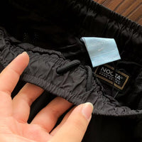 Pantalones Nocta Windbreaker Negros